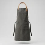 Barista apron in charcoal canvas with adjustable neck strap and front pocket