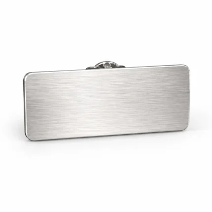 Engraved name badge product image for corporate uniform supply in the UAE and GCC.